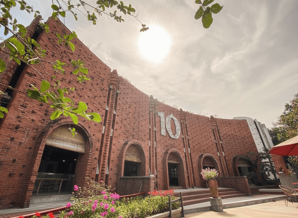The domed roofs, ceramic paths, and brick courtyards reflect the village spirit and unique artistry
